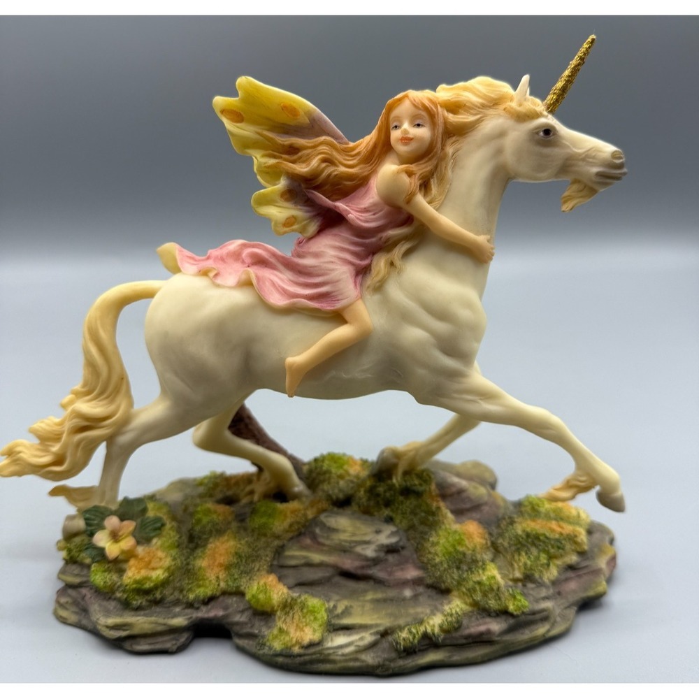 Large Summit Collection Finely Crafted Fairy Riding a Unicorn Figurine 8x7"